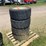 #7067-•-(4)-12-16.5-skid-steer-tires-on-rims-(deerbrook,-wi)-image-1