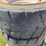 #7067-•-(4)-12-16.5-skid-steer-tires-on-rims-(deerbrook,-wi)-image-10