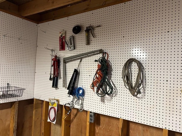 contents-of-wall.-cords,-stapler,-grease-gun-etc-image-1
