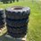 #7066-•-(4)-14.00-20-equipment-tires-on-rims-(deerbrook,-wi)-image-1