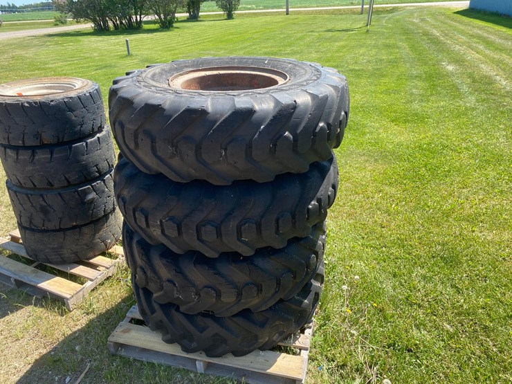 #7066-•-(4)-14.00-20-equipment-tires-on-rims-(deerbrook,-wi)-image-1