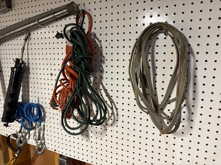 contents-of-wall.-cords,-stapler,-grease-gun-etc-image-3