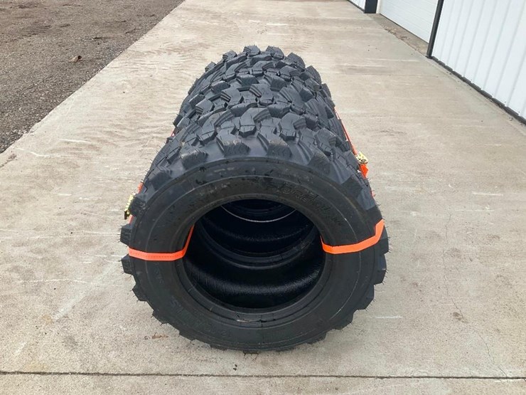 #4055-•-unused-set-of-skid-steer-tires-image-1