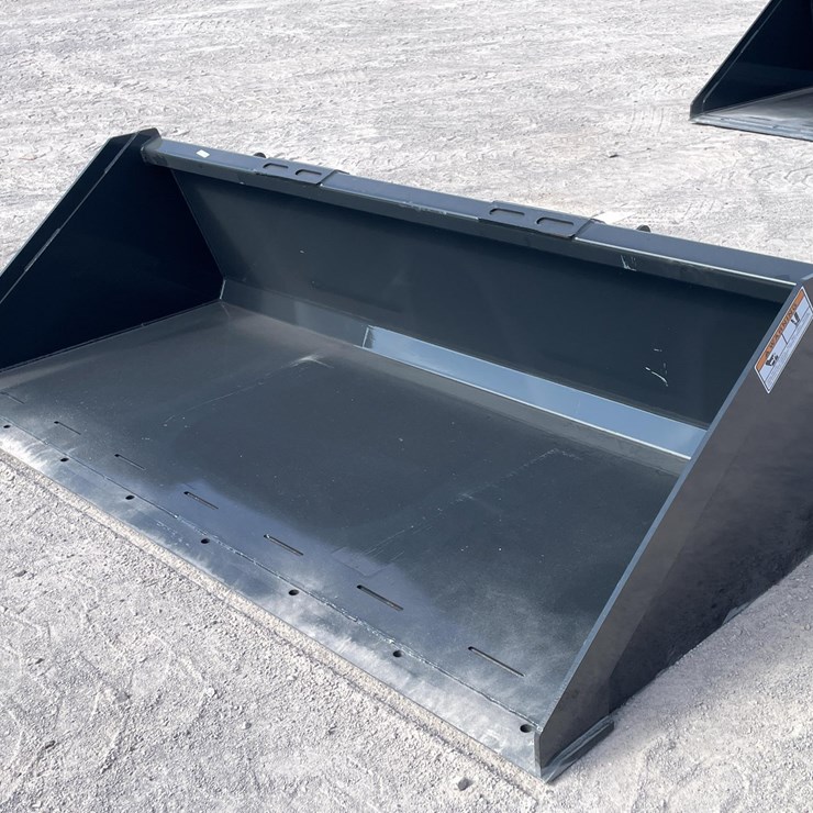 #2773 • Unused 2026 Wolverine Skid Steer Track Duty Bucket Attachments