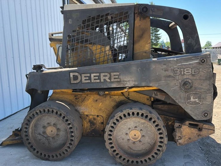 #1154-•-2010-john-deere318d-skid-steer-image-1