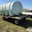 nurse-trailer-hayrack-w/-2,550-gal-poly-water-tank-image-3