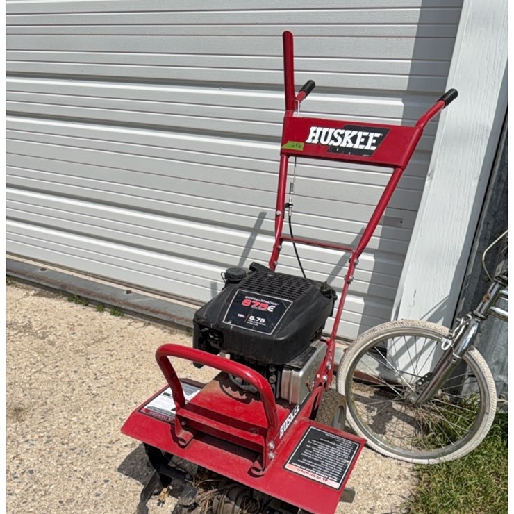 Front tine tiller, later newer model, gas engine
