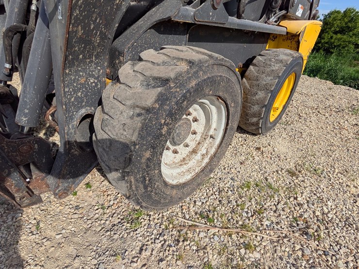 #5455-•-new-holland-218-skid-loader-image-14