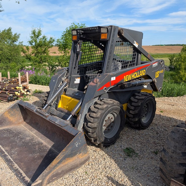 #5454 • New Holland 160 Skid Loader