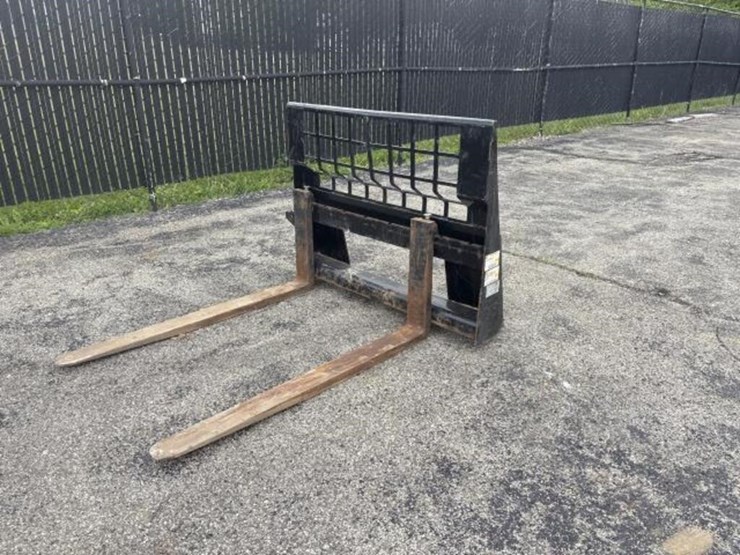 cat-skid-steer-fork-attachment-image-1