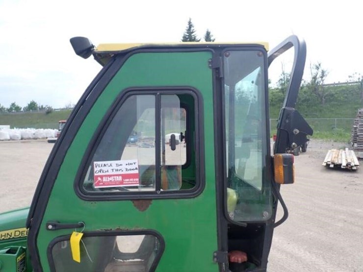2011-john-deere-1023e-image-27