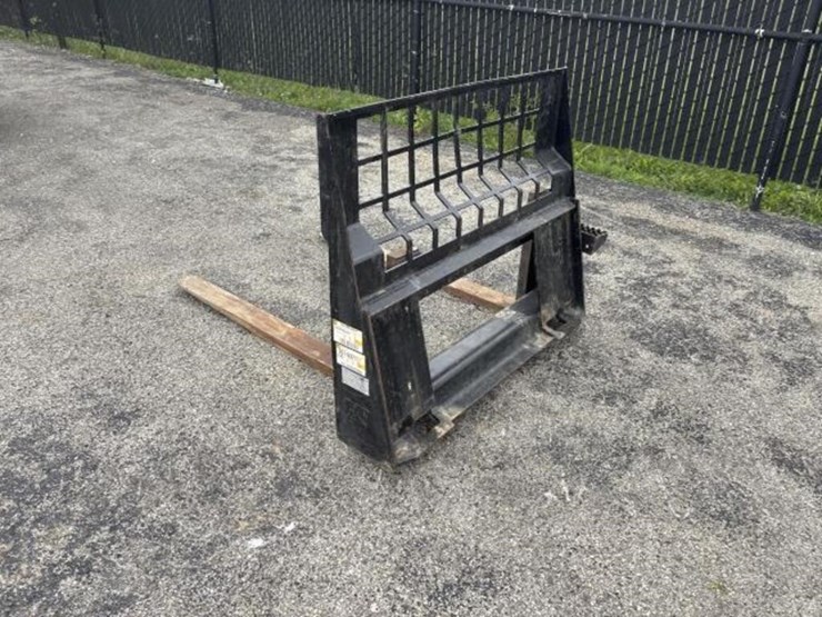 cat-skid-steer-fork-attachment-image-2