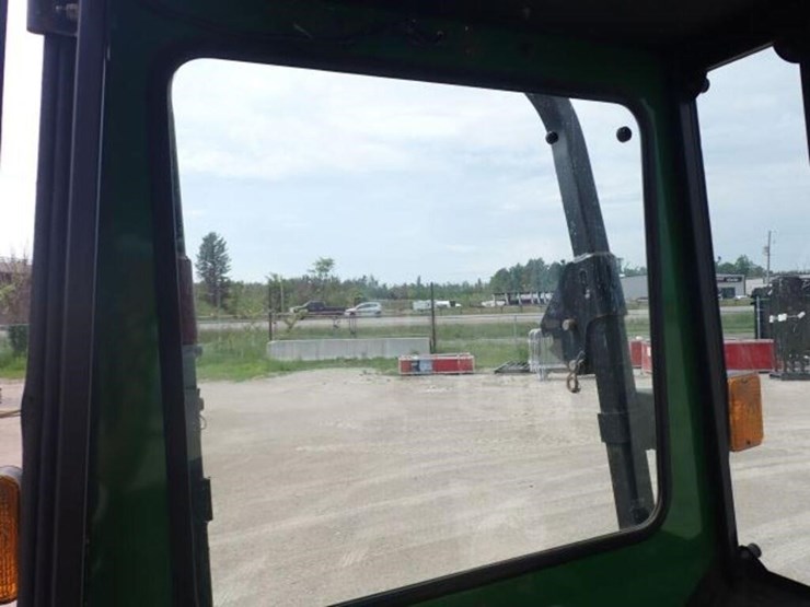 2011-john-deere-1023e-image-54