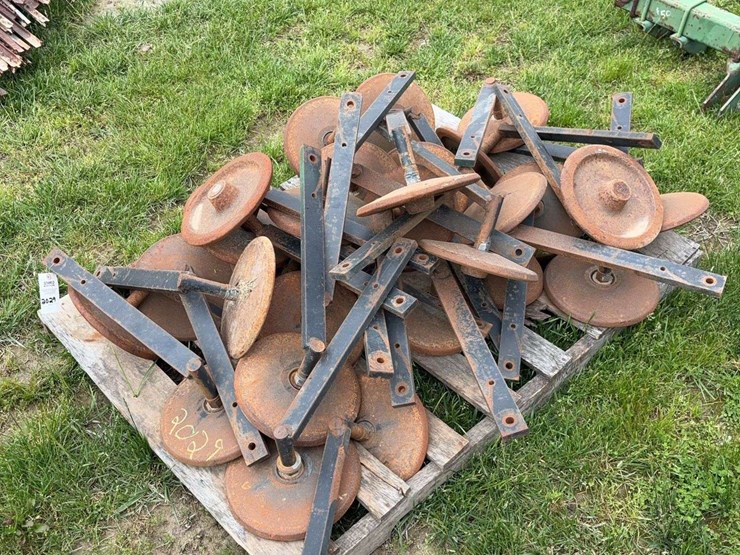 pallet-of-steel-closing-wheels-off-jd-750-drill-image-1