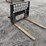 cat-skid-steer-fork-attachment-image-4
