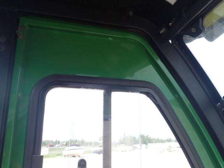 2011-john-deere-1023e-image-51