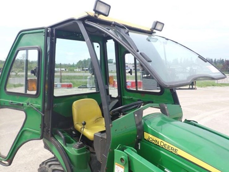 2011-john-deere-1023e-image-57