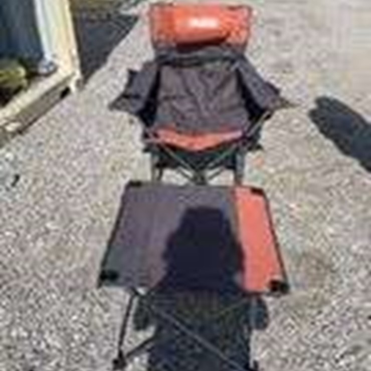 Collapsible camping chair. Orange-brown. Comes with foot stool and storage bag!