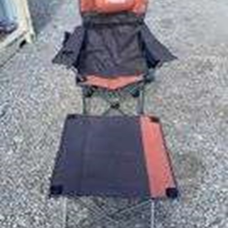 Collapsible camping chair. Orange-brown. Comes with foot stool and storage bag!