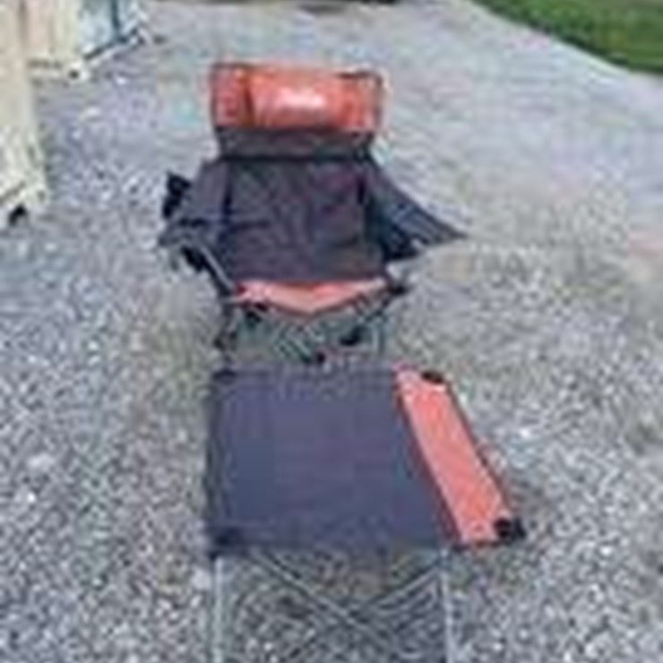 Collapsible camping chair. Orange-brown. Comes with foot stool and storage bag!