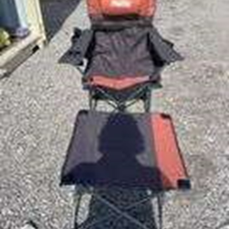 Collapsible camping chair. Orange-brown. Comes with foot stool and storage bag!