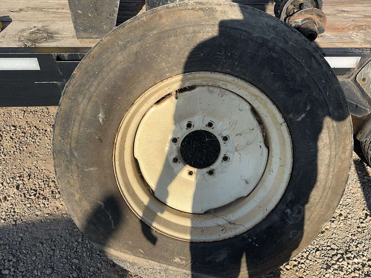 goodyear-tire-and-8-bolt-rim---295/75r225-tire-image-1