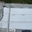 bundle-of-white-metal-roofing-panels-image-3