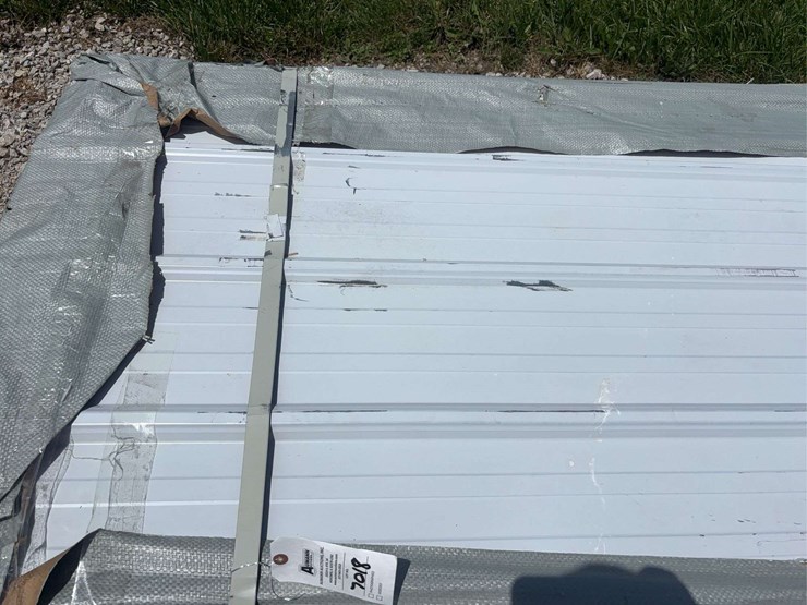 bundle-of-white-metal-roofing-panels-image-3