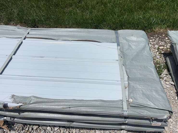bundle-of-white-metal-roofing-panels-image-6