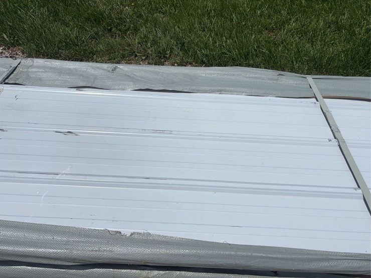 bundle-of-white-metal-roofing-panels-image-4