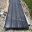 dark-gray-ribbed-metal-roofing-panels-image-1