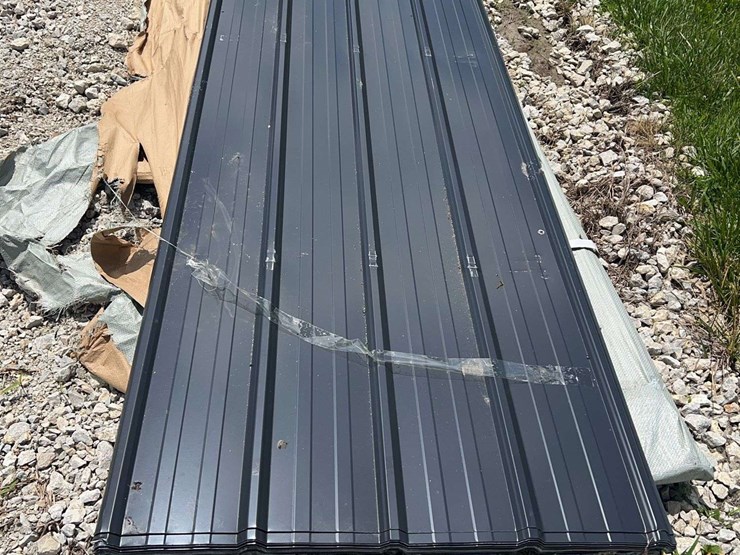 dark-gray-ribbed-metal-roofing-panels-image-1