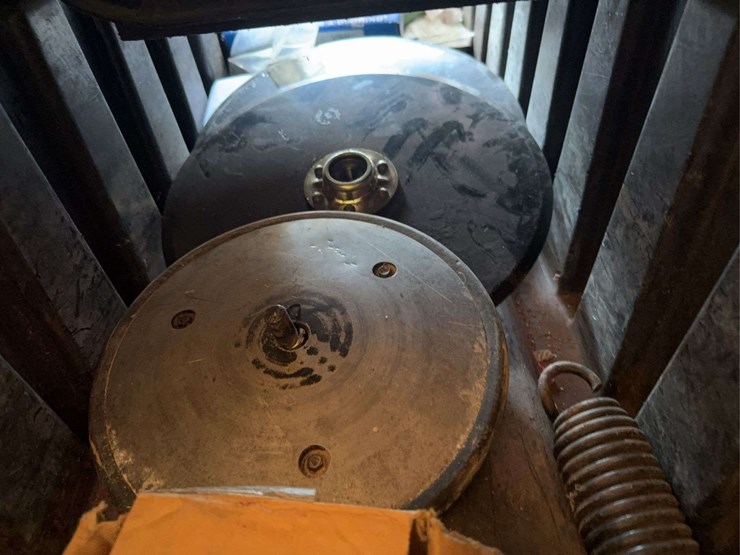 assortment-of-planter-parts,-talc,-closing-wheels,-springs,-bearings,-new-chains,-and-disc-blades-image-5