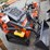 tpm-t460-stand-on-skid-steer-loader-image-1