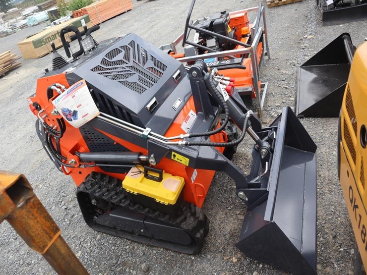 tpm-t460-stand-on-skid-steer-loader-image-1