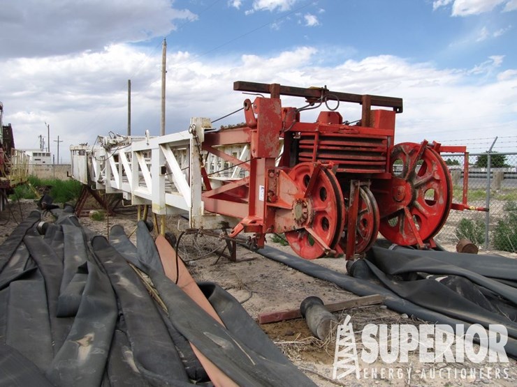(6-52)-sj-petro-105'h-265,000#-mast,-w/-rod-&-tubi...-image-1