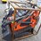 tpm-t460-stand-on-skid-steer-loader-image-1