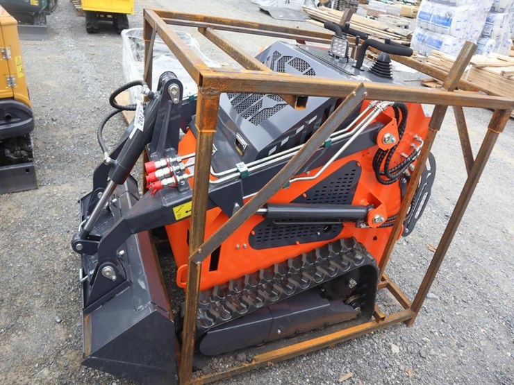 tpm-t460-stand-on-skid-steer-loader-image-1
