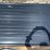 dark-gray-ribbed-metal-roofing-panels-image-4