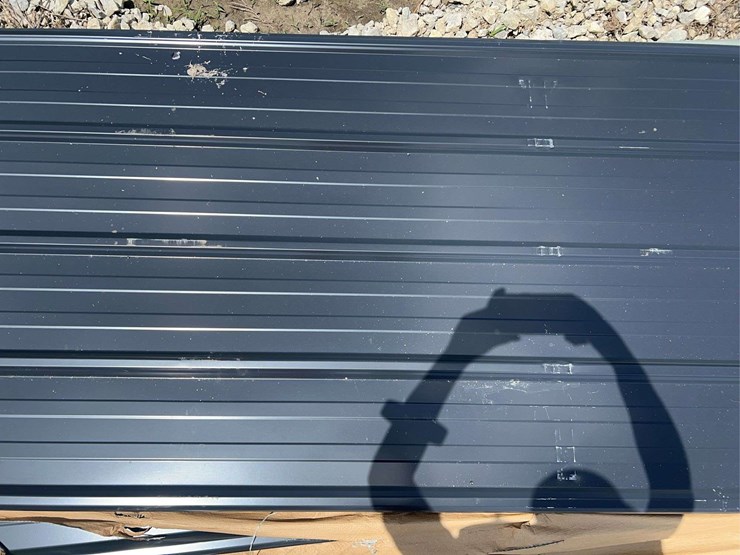 dark-gray-ribbed-metal-roofing-panels-image-4