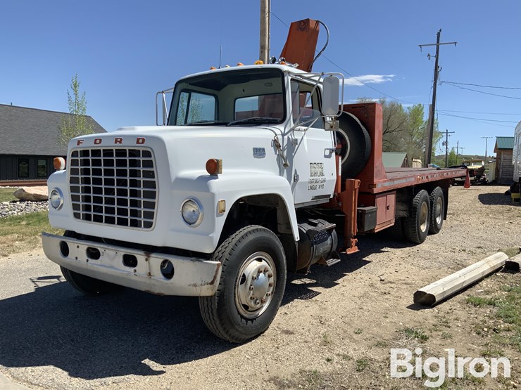 1975-ford-lt8000-t/a-rollback-truck-w/knuckle-boom-&-winch-image-1