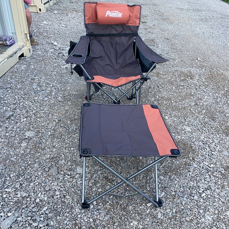 Collapsible camping chair. Orange-brown. Comes with foot stool and storage bag!