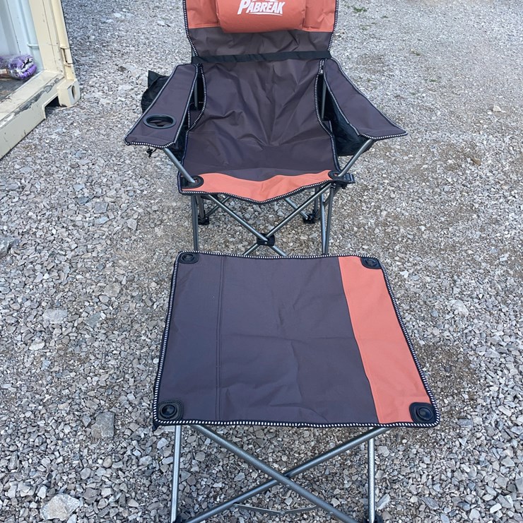 Collapsible camping chair. Orange-brown. Comes with foot stool and storage bag!