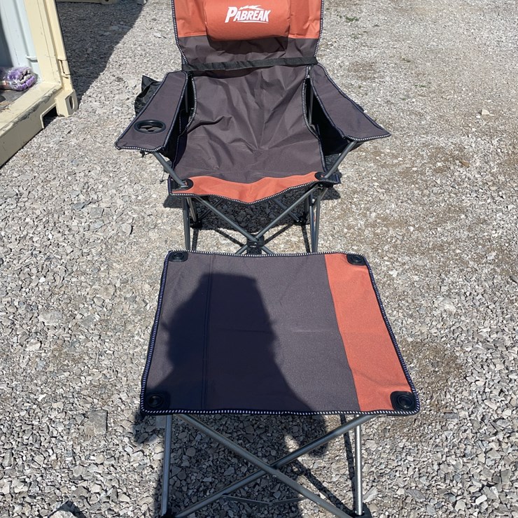 Collapsible camping chair. Orange-brown. Comes with foot stool and storage bag!