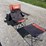 collapsible-camping-chair.-orange-brown.-comes-with-foot-stool-and-storage-bag!-image-2