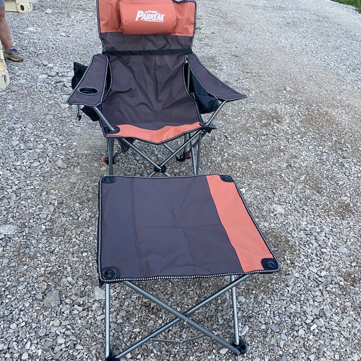 Collapsible camping chair. Orange-brown. Comes with foot stool and storage bag!