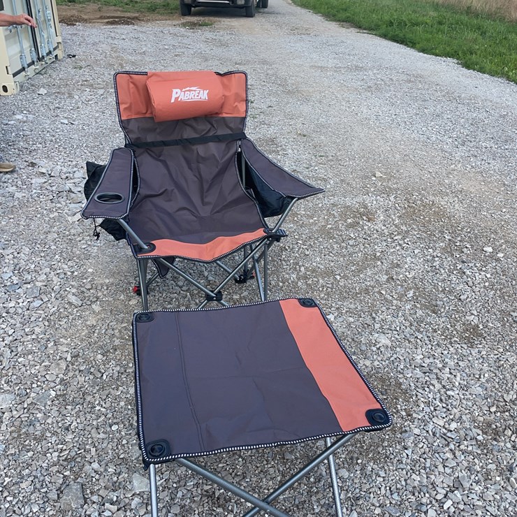 Collapsible camping chair. Orange-brown. Comes with foot stool and storage bag!