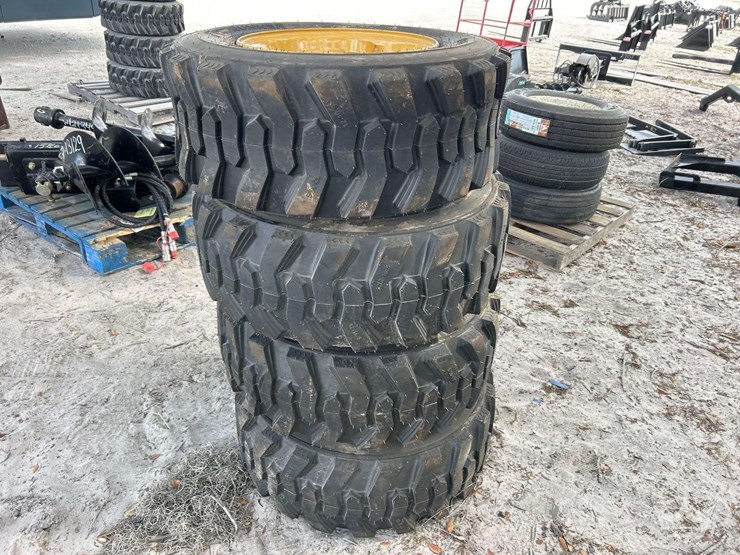 set-of-4-unused-forerunner-12-16.5n.h.s.-skid-steer-wheels-and-tires-image-3