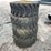 set-of-4-unused-forerunner-12-16.5n.h.s.-skid-steer-wheels-and-tires-image-2