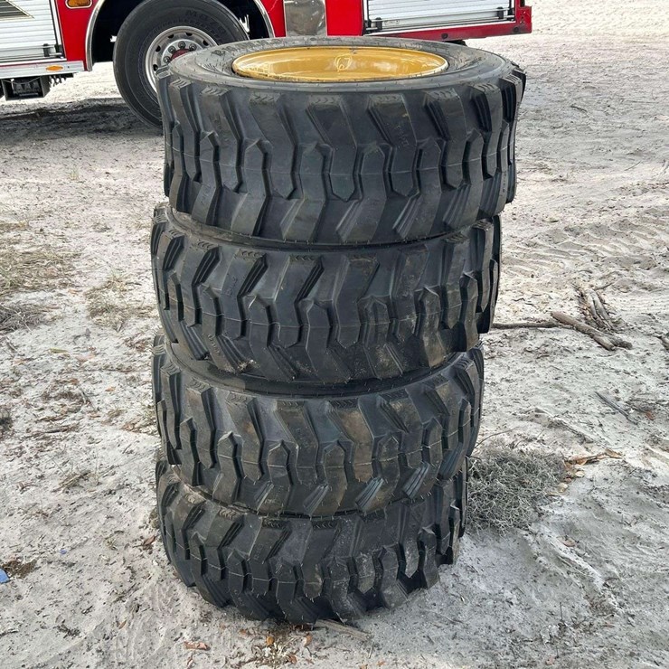 Set of 4 Unused ForeRunner 12-16.5N.H.S. Skid Steer Wheels and Tires